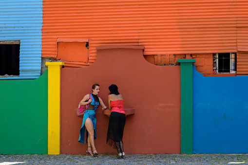 La Boca, Buenos Aires, February 20, 2018: Two visitors are seen taking break at La Boca in the Buenos Aires