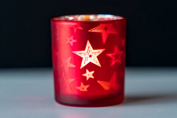 istock Idyllic scene with red candlestick with ornaments against white background. 1889661023