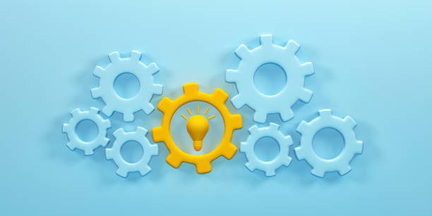 istock 3D rendering, 3D illustration. Gear wheels. cogs and gears mechanism on blue background. Teamwork cooperation machine symbolism concept. 1889672130