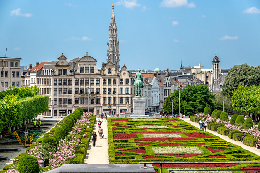 Bruges Belgium, city skyline at Spiegelrei Canal with summer flower