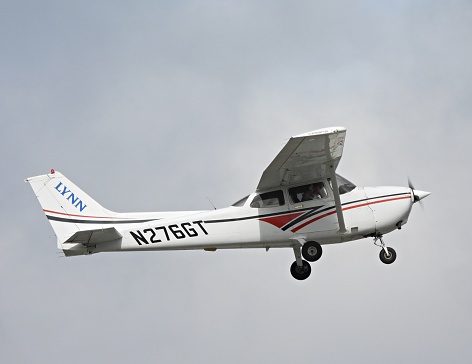 Boca Raton, Palm Beach County, Florida, USA, December 8, 2023. A Cessna\nfixed wing single engine (4 seats / 1 engine) N276GT taking off from the Boca Raton Airport.