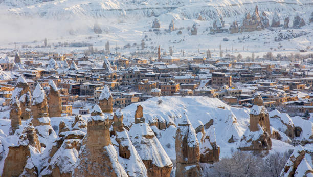 Pigeon Valley Pigeon Valley and Cave town in Goreme during winter time. Cappadocia, Turkey. nevsehir stock pictures, royalty-free photos & images