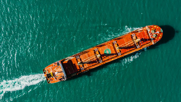 istock Cargo ship sails on sea. Aerial above top drone view. 1889739184
