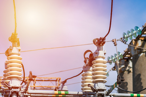 High voltage power transformer in substation.general view to high-voltage substation with switches.Sunny day.