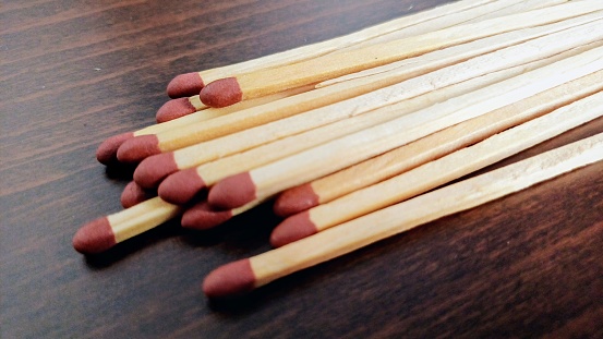 Matchsticks and box on a white background.