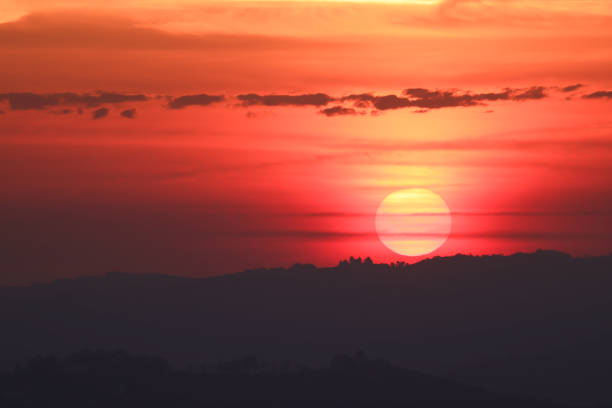 rising sund behind a mountain ridge in Piedmont