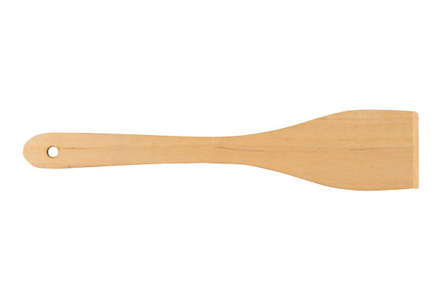 istock Top view of a wooden kitchen spatula on a white background. 1889855533