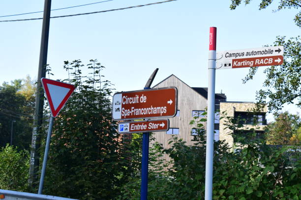 traffic signs towards the race track spa - corner marking fotos imagens e fotografias de stock