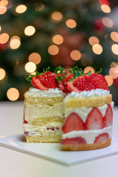 istock Christmas tree and strawberry cake 1889869955