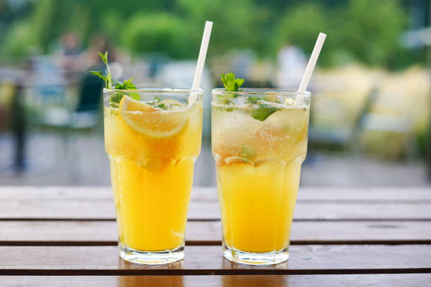 istock Trendy summer drinks with orange on the table in the cafe 1889890400
