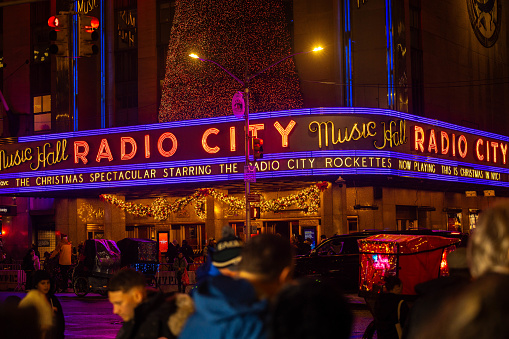 Radio City Music Hall with crowds in the foreground. December 2023. New York City, NY. USA