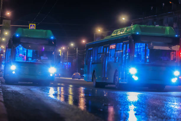 istock Buses move at night along the city 1889924594