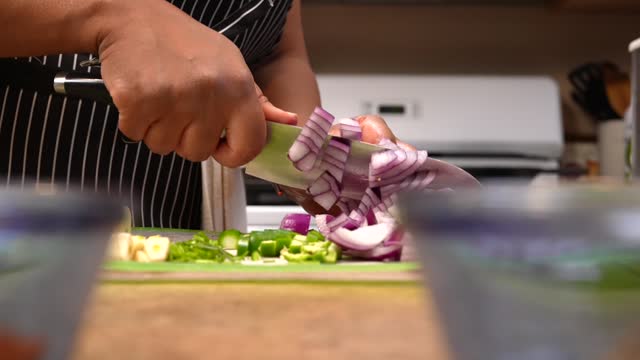 Chopping onions for a homemade Indian recipe - Chana Masala series