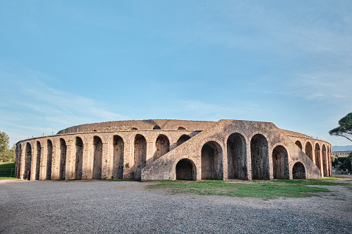 Naples, Italy - October 31 2023: The Amphitheatre of Pompeii is one of the oldest surviving Roman amphitheatres. It is located in the ancient Roman city of Pompeii
