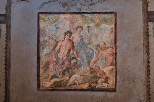 Ercolano, Italy - 25 November, 2023: fresco wall mural in detail in the ancient Roman city of Herculaneum