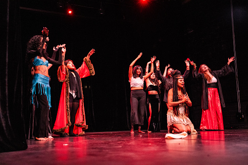 Actresses singing in the theater stage