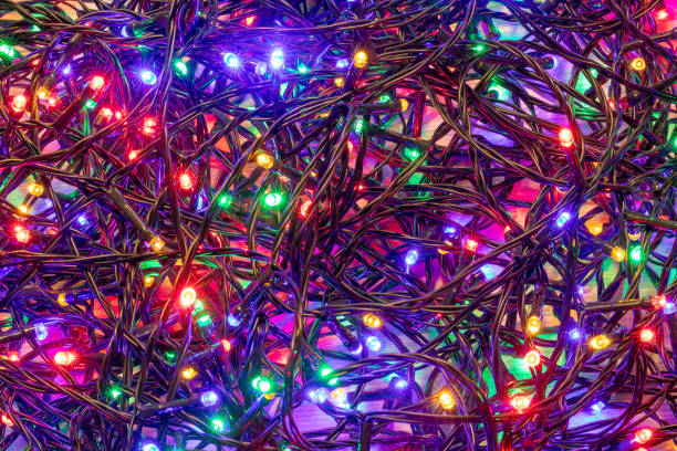 istock Vibrant LED Christmas Lights Pile - Festive Aftermath Background - Testing Christmas Lights 1890151029