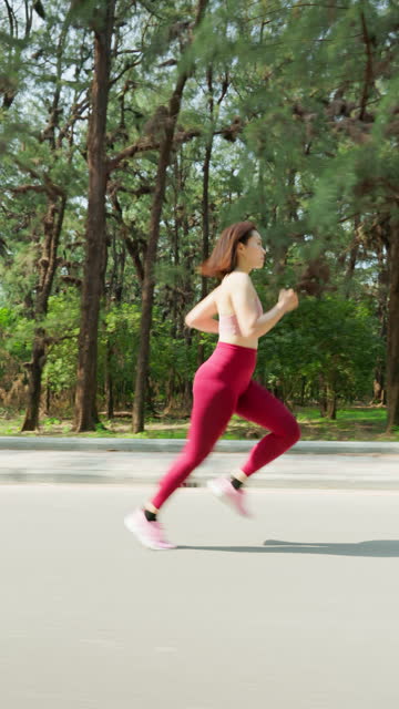 asian woman running a marathon