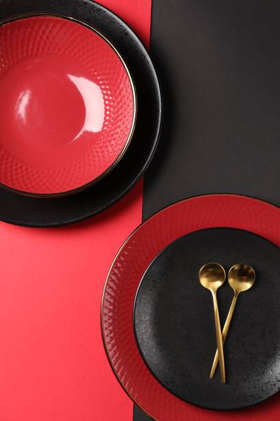 istock Stylish table setting with plates and spoons on color background, top view 1890330369