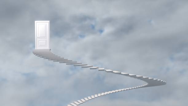 istock White staircase to a door against a colorful sky 1890368829
