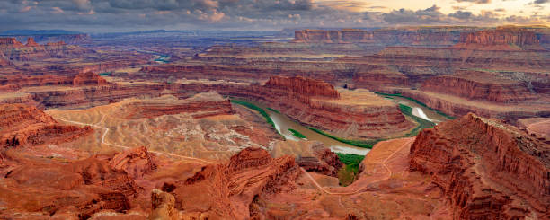 Dead Horse Point in Utah at Sunset Dead Horse Point State Park near Moab, Utah at sunset canyonlands national park stock pictures, royalty-free photos & images