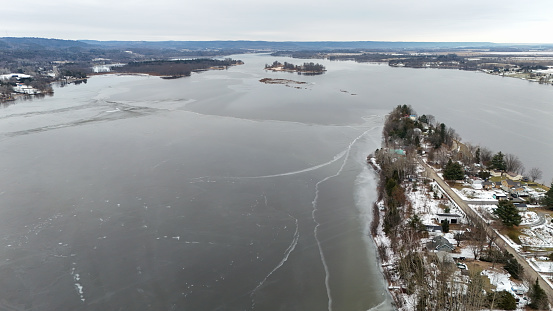 Frozen landscape over river in Canada