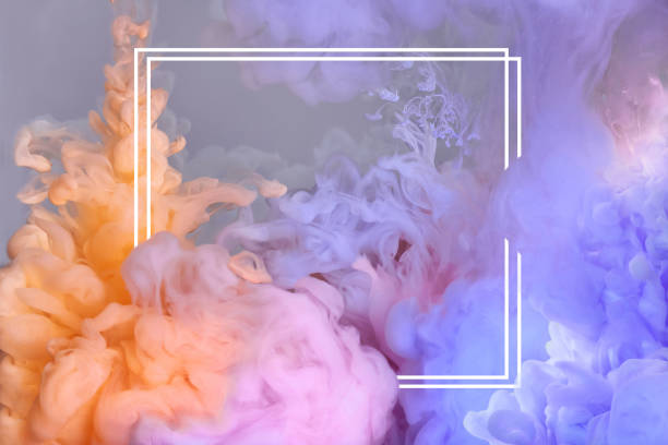 istock Splashes of colorful ink and frame on grey background 1890518112