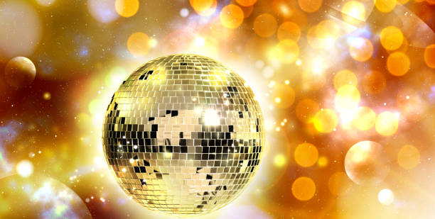 istock Shiny disco ball under golden lights, banner design. Bokeh effect 1890518632