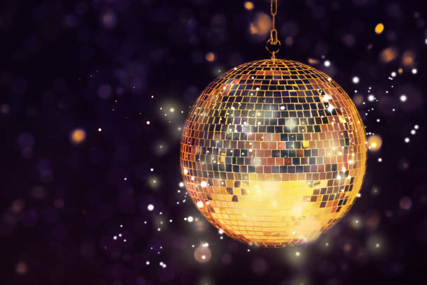 istock Shiny disco ball on dark purple background with blurred lights, space for text. Bokeh effect 1890521216