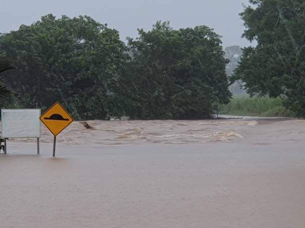 istock Inundated bridge and causeway with Floodwaters Innisfail 1890530537