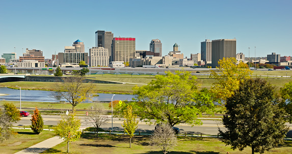 Aerial still of downtown Dayton, Ohio, on a clear day in Fall.