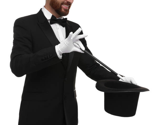 istock Magician showing magic trick with top hat on white background, closeup 1890658883
