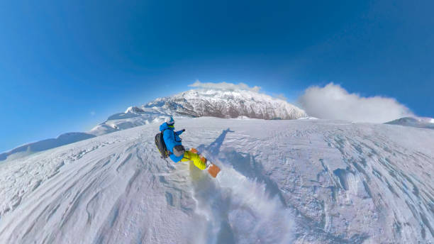 istock SELFIE: Adventurous snowboarder is leaving first tracks in fresh powder snow 1890680113