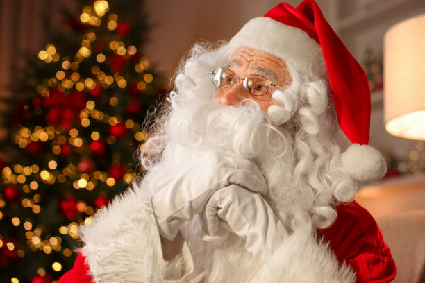 istock Santa Claus in room with Christmas tree 1890752797