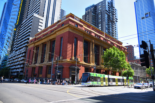 Melbourne, Victoria, Australia - 23 Dec 2023 - A cityscape view with a tram service at town centre.