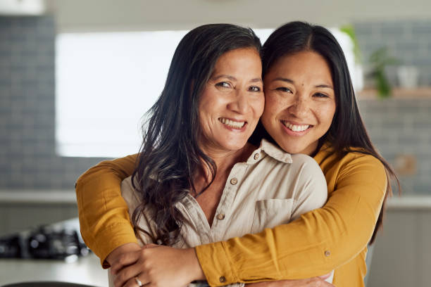 istock Two Asian Female Family Members Embracing 1890894566