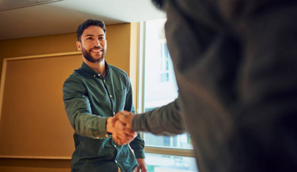 istock Confident Businessman In A Meeting 1890898321