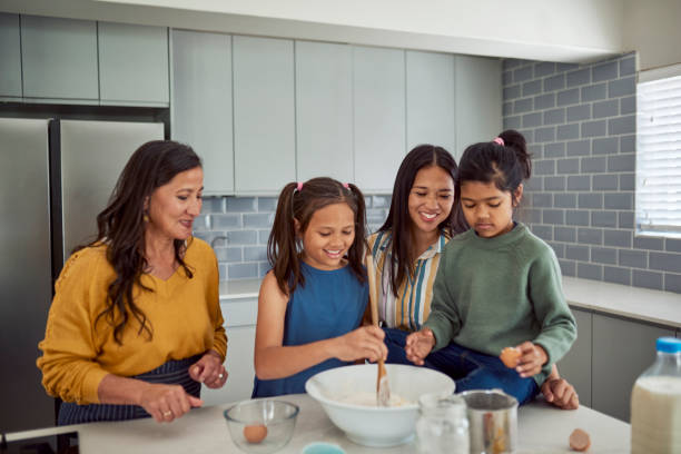 istock Family Baking Together In Kitchen 1890910820