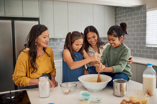 istock Multigenerational Family Baking Together In Kitchen 1890910833