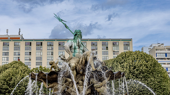 Berlin, Germany - July 24, 2023: The Roman Neptune or Zeus fountain in Berlin in Germany Europe.