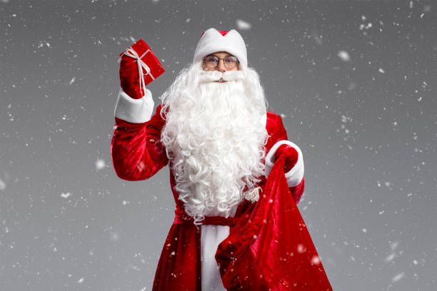 istock Noel or Saint Nicholas holding gifts isolated 1891072165