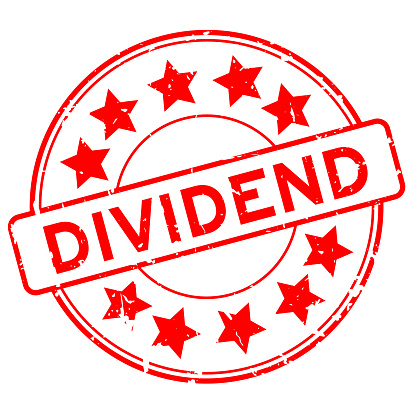 Grunge red dividend word round rubber seal stamp on white background