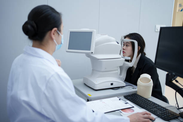istock Ophthalmologist examining woman's eyes 1891124569
