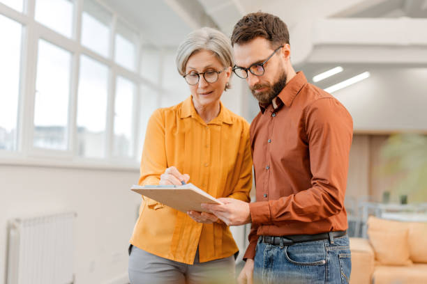 istock Business people, successful colleagues communication, brainstorming, planning startup office 1891128184