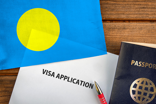 Visa application form, passport and flag of Palau