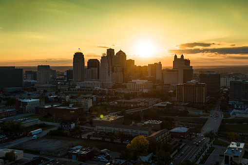 Aerial shot of downtown Kansas City, Missouri at sunset.\n\nAuthorization was obtained from the FAA for this operation in restricted airspace.