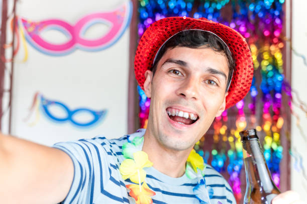 istock Drinking beer at carnival party 1891192026