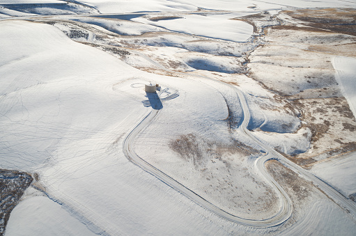 Landscape covered in snow from drone point of view.