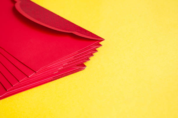 istock Side view of yellow envelopes on yellow cover with customizable space for text. 1891333714