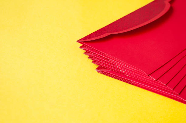 istock Side view of yellow envelopes on yellow cover with customizable space for text. 1891333716